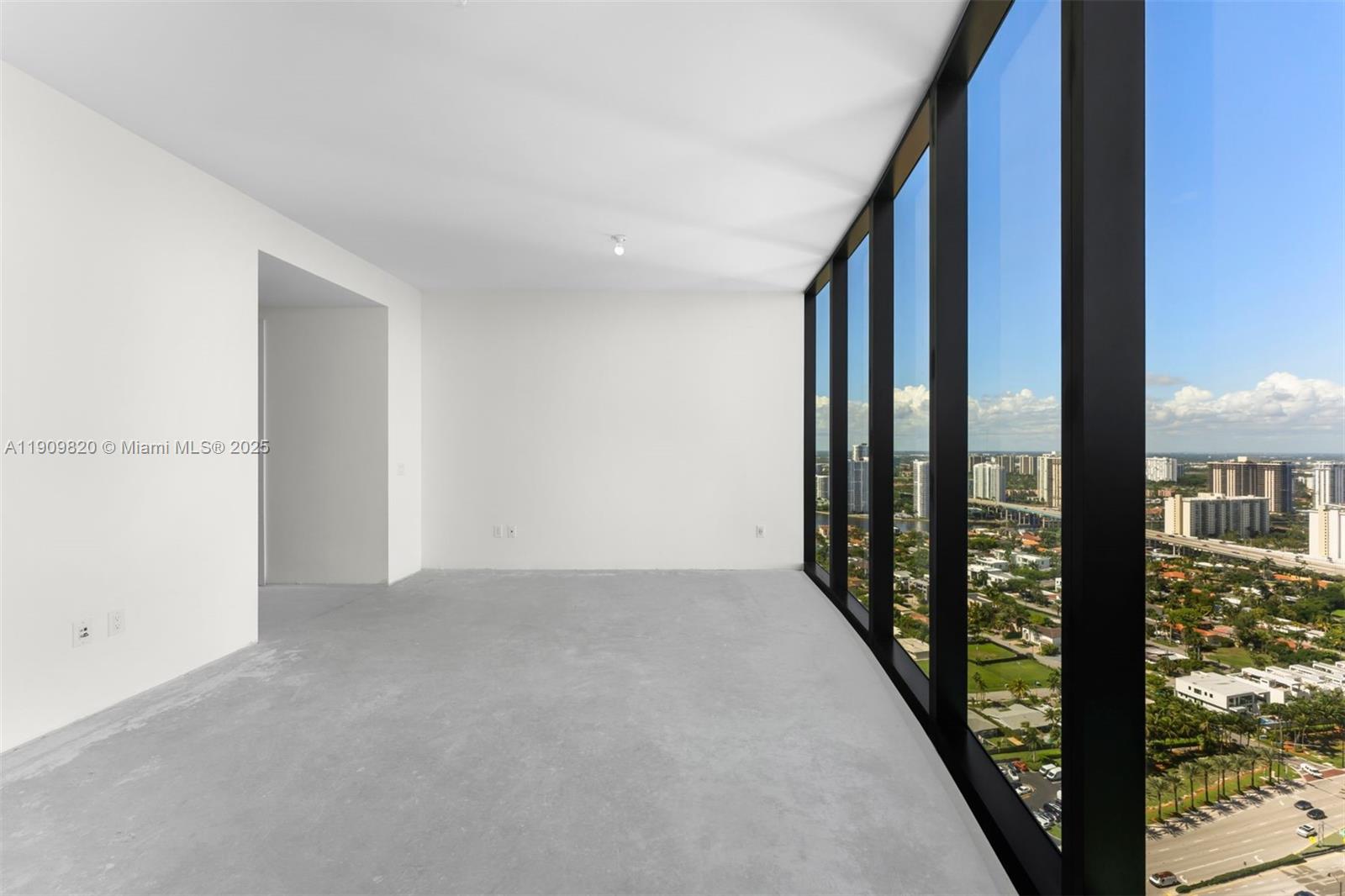 18555 Collins Avenue, Unit 3205 Sunny Isles Beach, FL 33160 - Photo 24 of 50 a view of a city from a balcony