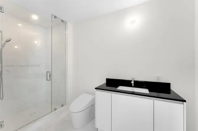 a view of kitchen with furniture and cabinet