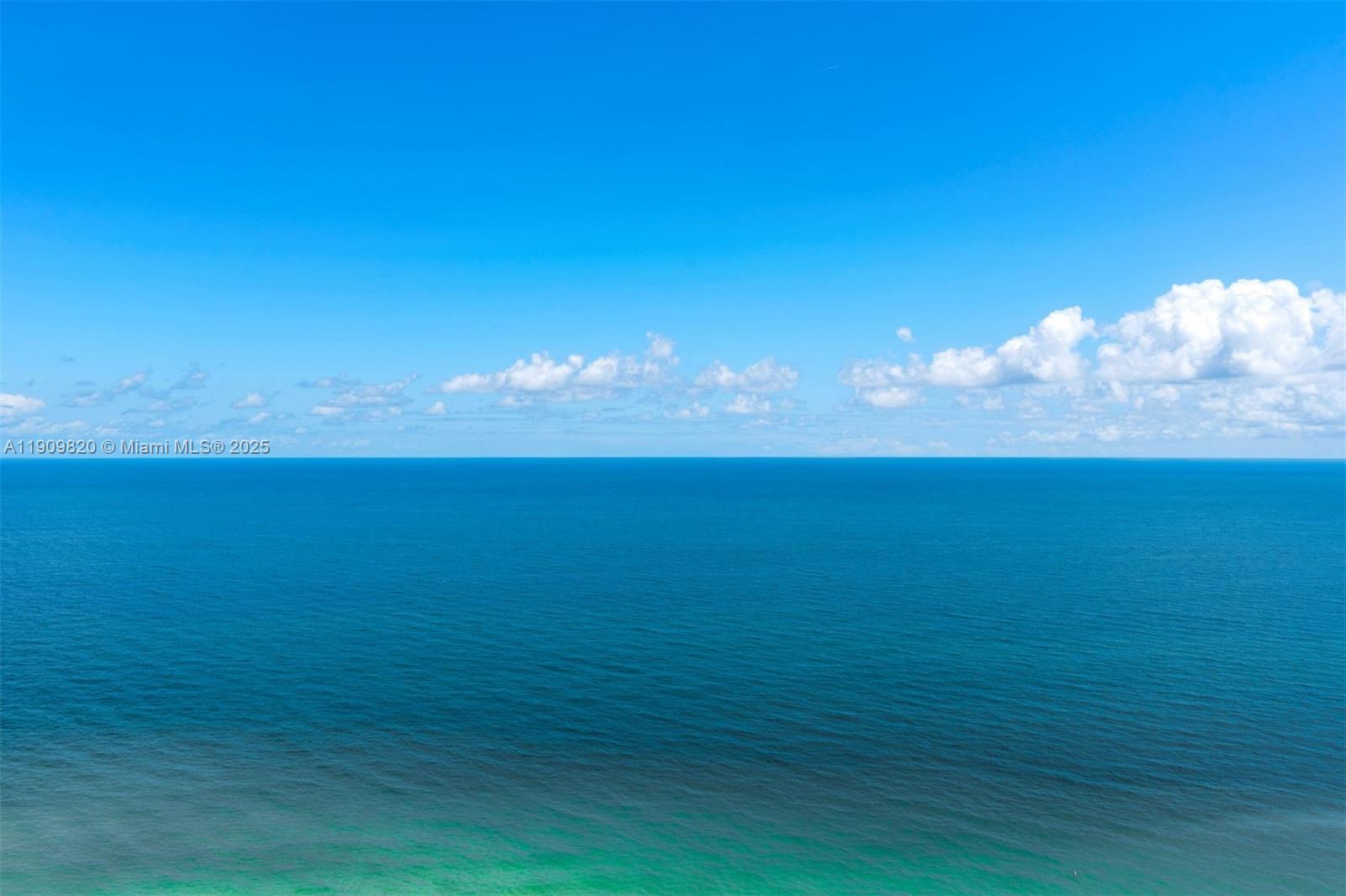 18555 Collins Avenue, Unit 3205 Sunny Isles Beach, FL 33160 - Photo 44 of 50 a view of an ocean