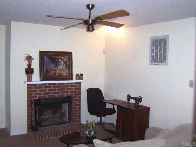 3431 Mill Run, Unit 97 Raleigh, NC 27612 - Photo 2 of 6 living room