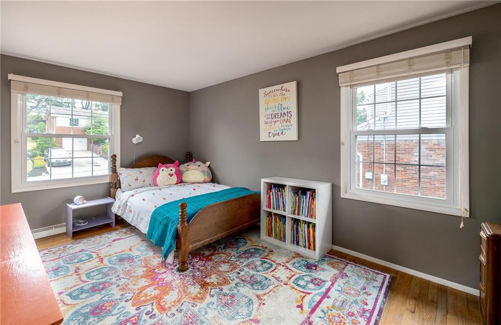 209 Foxcroft Road Pittsburgh, PA 15220 - Photo 14 of 24 Second bedroom with hardwood floors