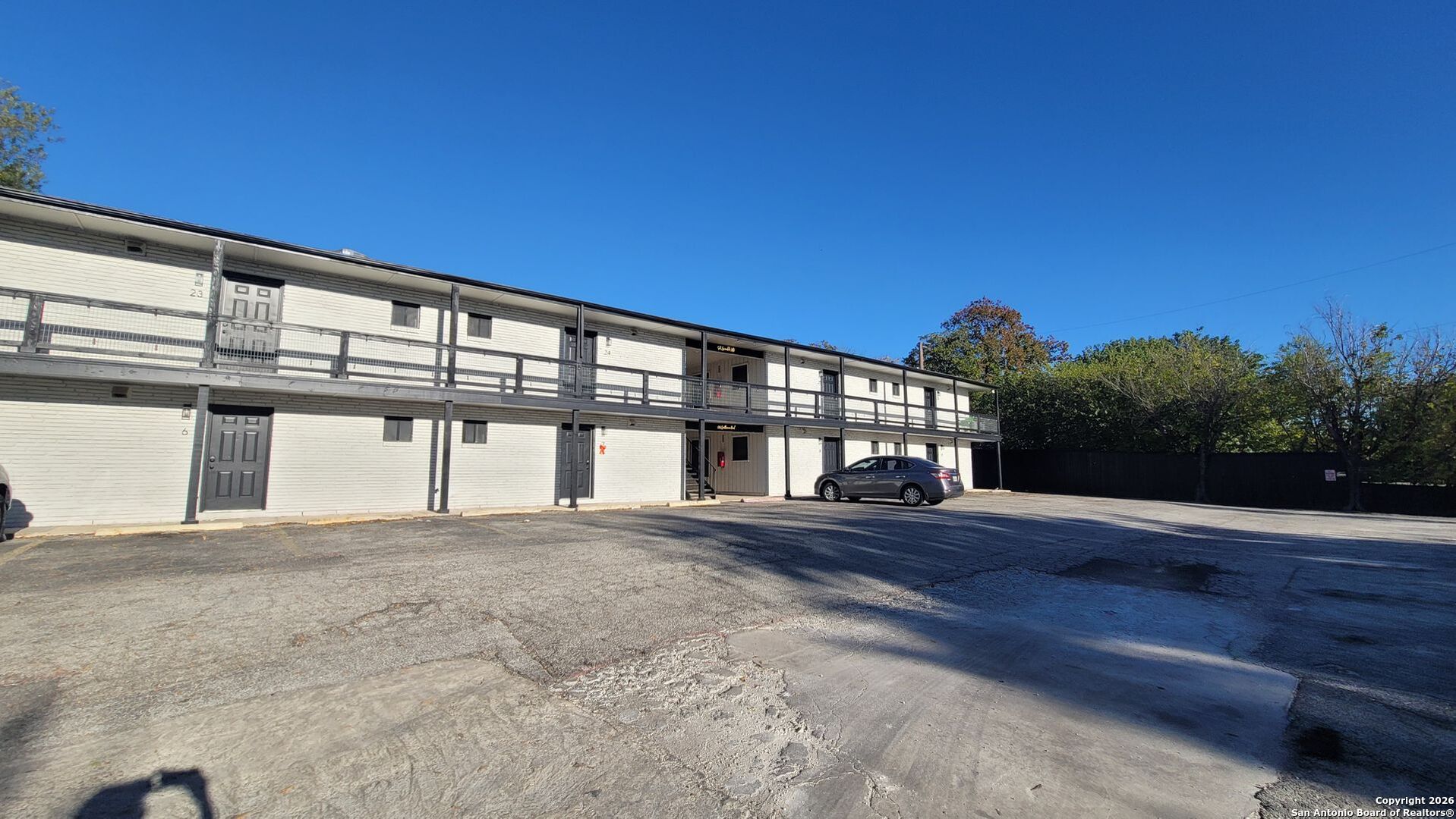 516 Gentleman Road, Unit 17 Balcones Heights, TX 78201 - Photo 20 of 29 a front view of a building with a garden