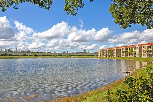 a view of an ocean and city