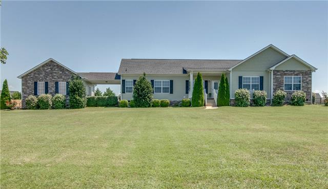 2250 Clara Mathis Road Spring Hill, TN 37174 - Photo 1 of 20 front view of a house with a yard