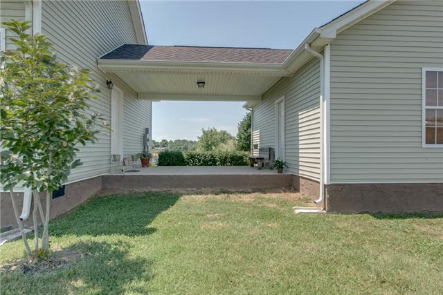 2250 Clara Mathis Road Spring Hill, TN 37174 - Photo 17 of 20 a view of backyard with plants and outdoor seating