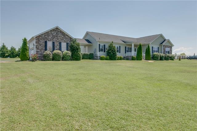 2250 Clara Mathis Road Spring Hill, TN 37174 - Photo 2 of 20 a front view of a house with a garden