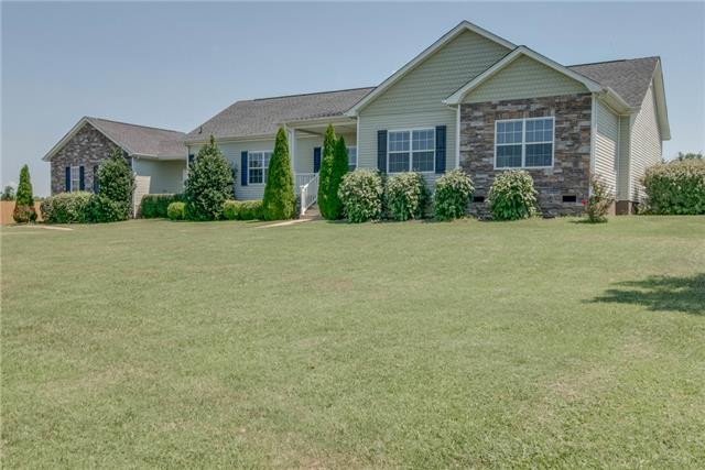 2250 Clara Mathis Road Spring Hill, TN 37174 - Photo 3 of 20 front view of a house with a yard