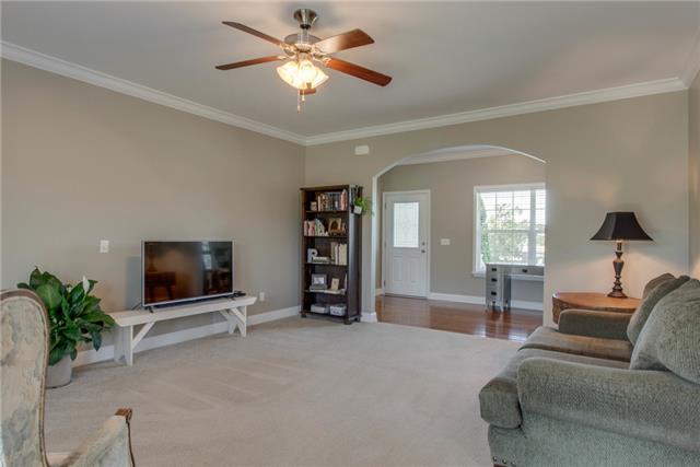 2250 Clara Mathis Road Spring Hill, TN 37174 - Photo 5 of 20 a living room with furniture and a flat screen tv