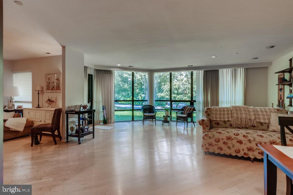 4001 Old Court Road, Unit 101 Pikesville, MD 21208 - Photo 6 of 27 LIVING ROOM WITH HARDWOOD FLOORS