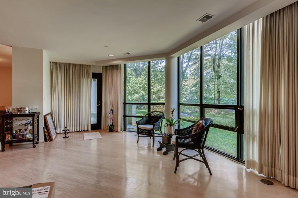 4001 Old Court Road, Unit 101 Pikesville, MD 21208 - Photo 7 of 27 LIVING ROOM WITH DOOR TO PATIO
