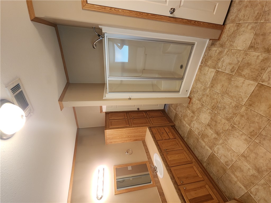 3738 Smetana Road Bryan, TX 77807 - Photo 14 of 29 a view of a kitchen with refrigerator and sink