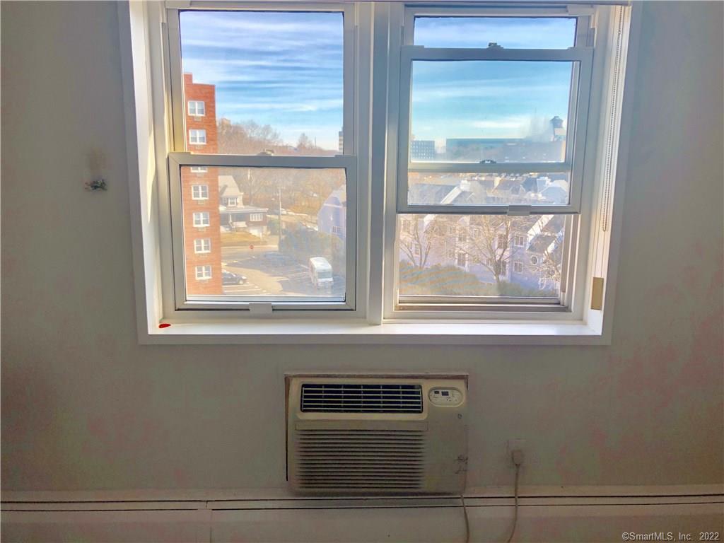 99 Prospect Street, Unit 7K Stamford, CT 06901 - Photo 16 of 25 a view of a wooden door and a window