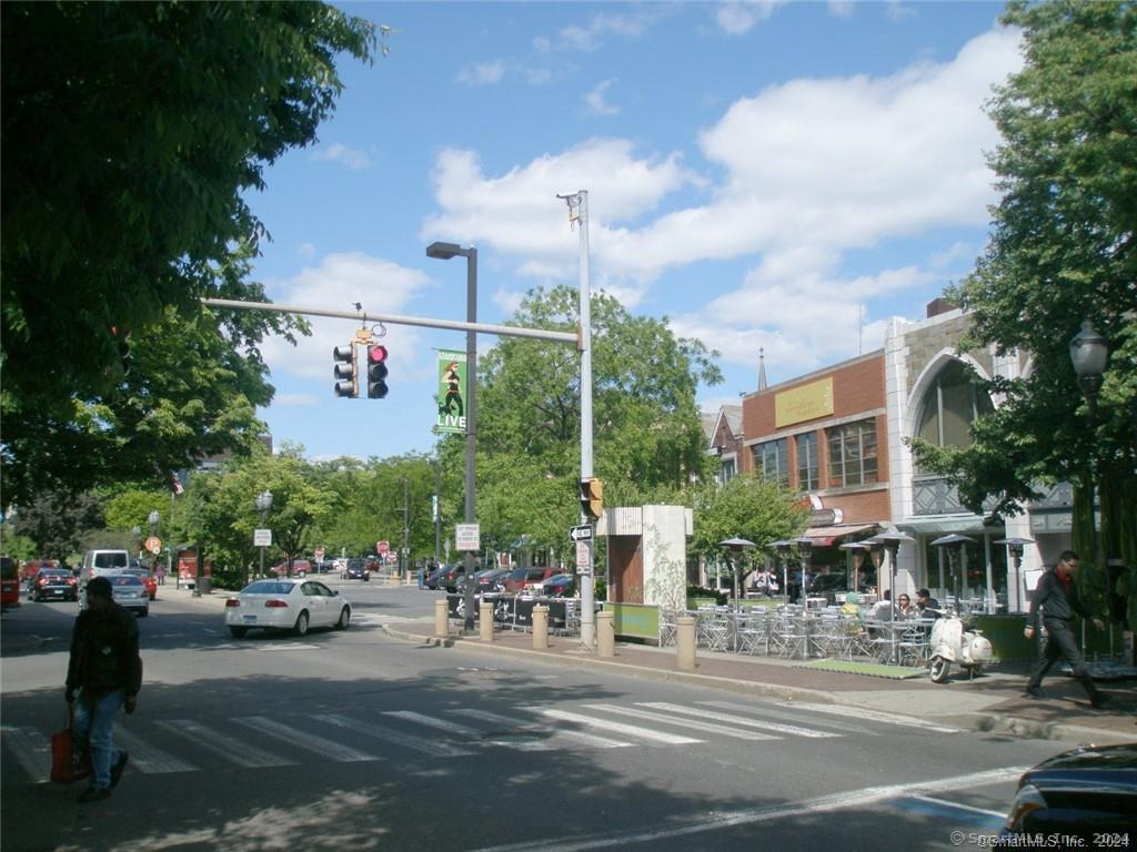 99 Prospect Street, Unit 7K Stamford, CT 06901 - Photo 22 of 25 a city street lined with buildings and trees