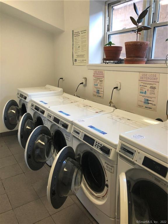 99 Prospect Street, Unit 7K Stamford, CT 06901 - Photo 7 of 25 a utility room with dryer and washer