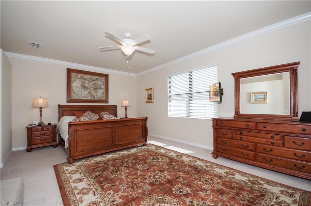 9114 Prima Way, Unit 202 Naples, FL 34113 - Photo 7 of 13 Master Bedroom