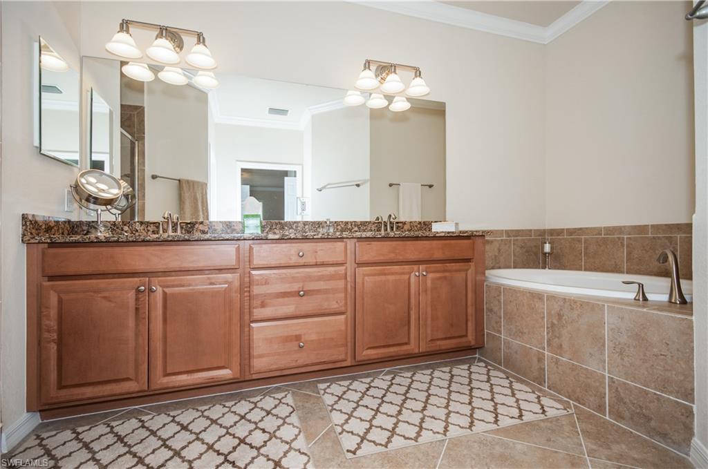 9114 Prima Way, Unit 202 Naples, FL 34113 - Photo 8 of 13 Master bath includes walk-in shower