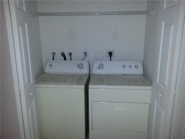 4103 Southwest 159th Avenue, Unit 49 Miramar, FL 33027 - Photo 17 of 20 a utility room with dryer and washer