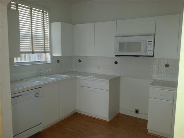 4103 Southwest 159th Avenue, Unit 49 Miramar, FL 33027 - Photo 8 of 20 a room with a sink and a mirror