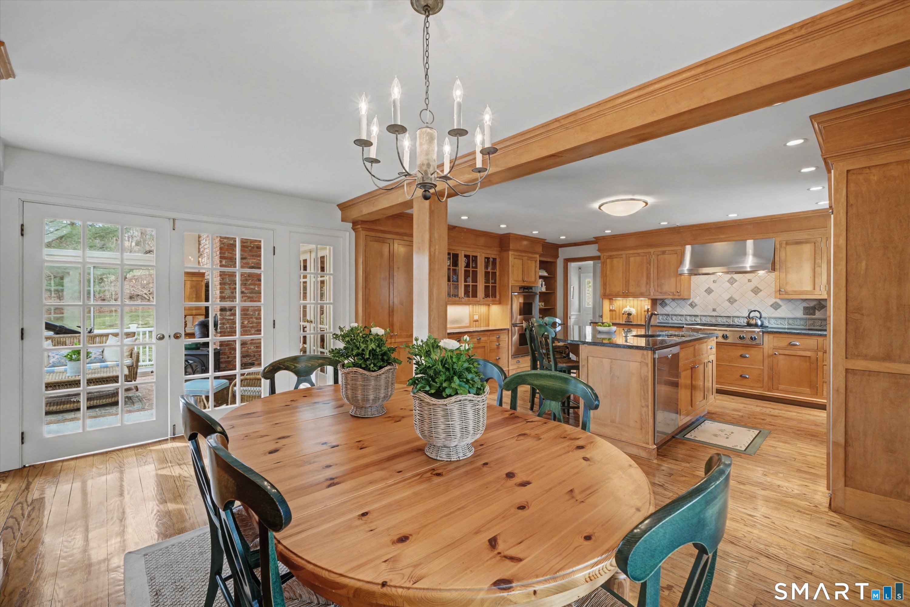 78 Keelers Ridge Road Wilton, CT 06897 - Photo 13 of 40 a view of a dining room with furniture window and wooden floor