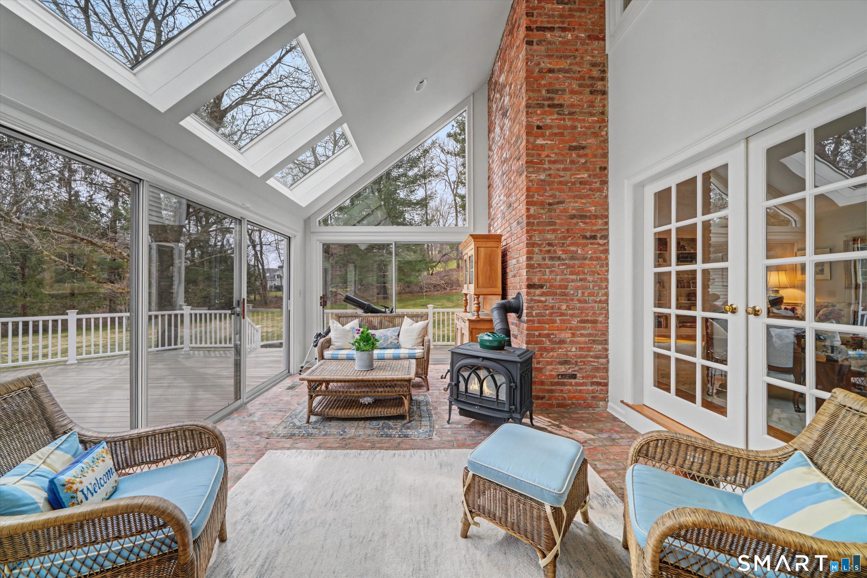 78 Keelers Ridge Road Wilton, CT 06897 - Photo 14 of 40 a living room with furniture and a floor to ceiling window