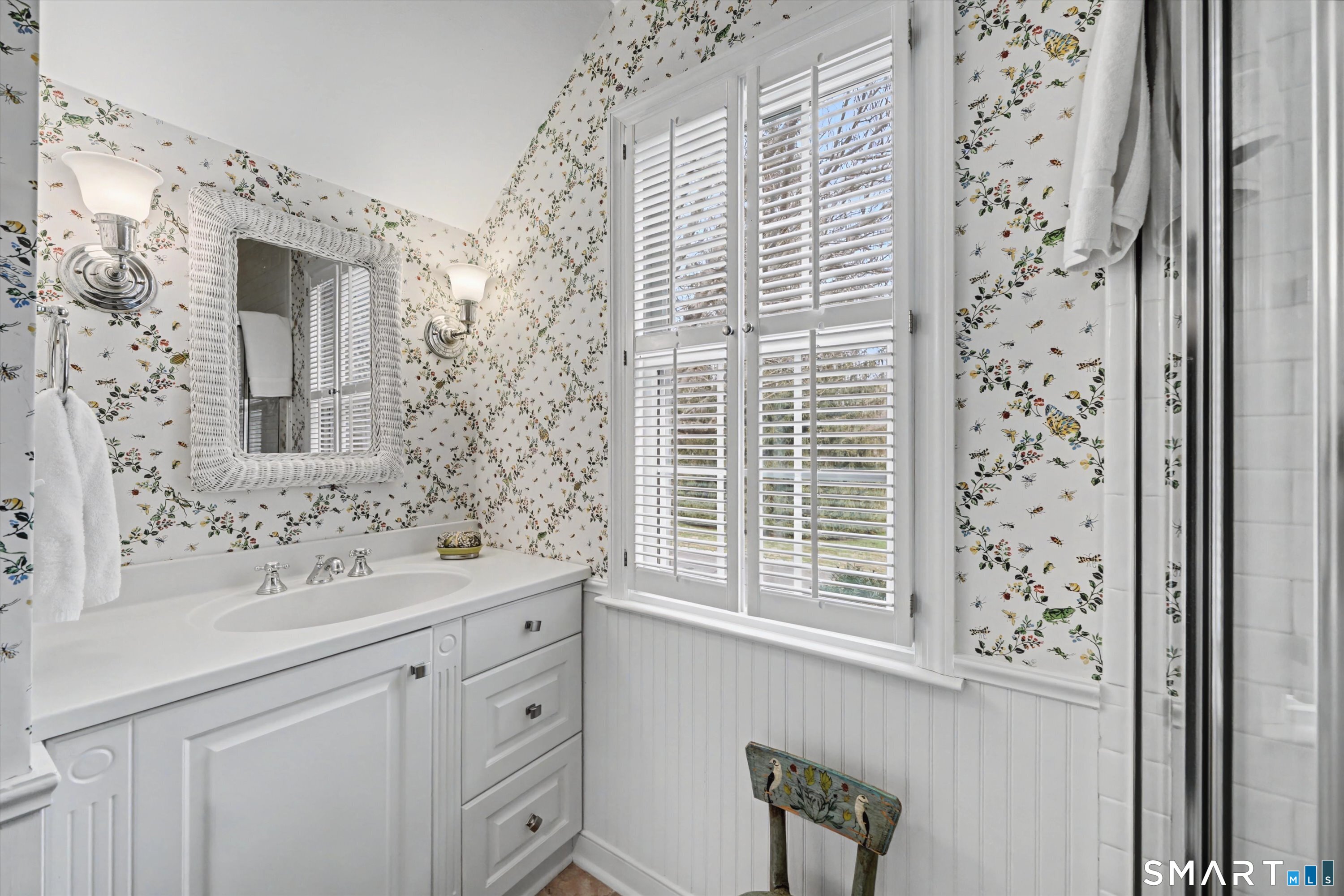 78 Keelers Ridge Road Wilton, CT 06897 - Photo 18 of 40 a bathroom with a sink and a mirror
