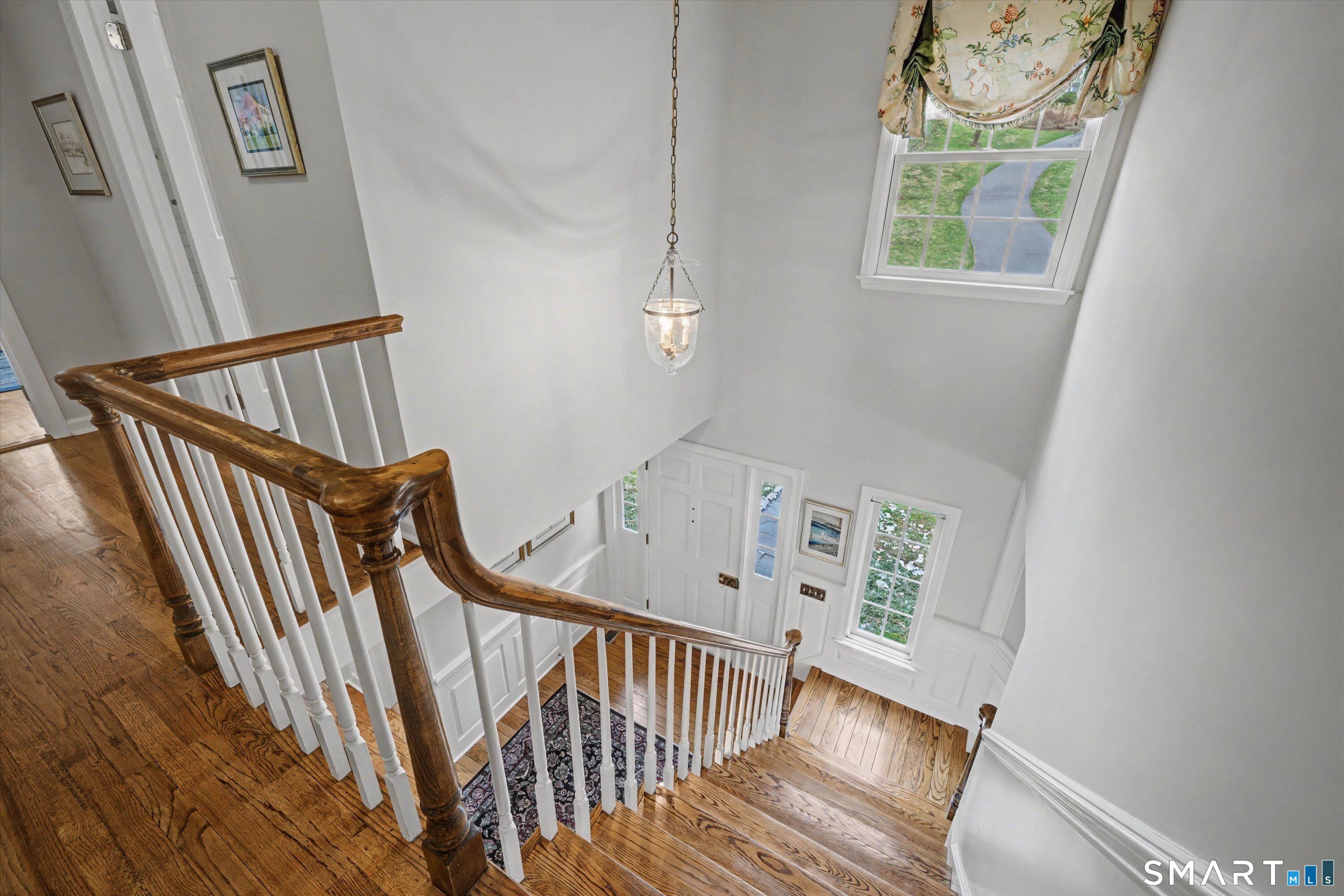 78 Keelers Ridge Road Wilton, CT 06897 - Photo 21 of 40 a view of staircase with railing and white walls
