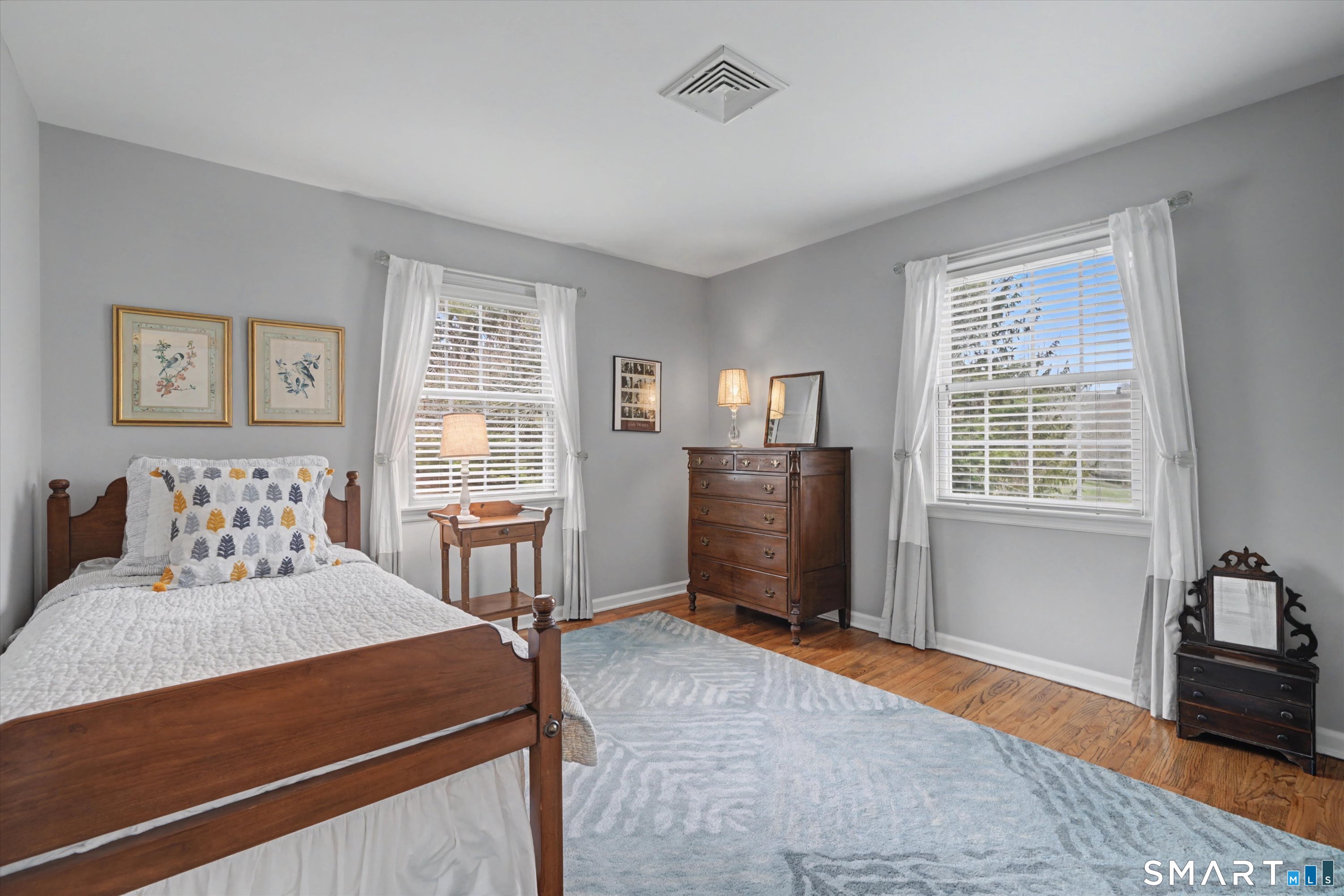 78 Keelers Ridge Road Wilton, CT 06897 - Photo 25 of 40 a bedroom with a bed and a couch