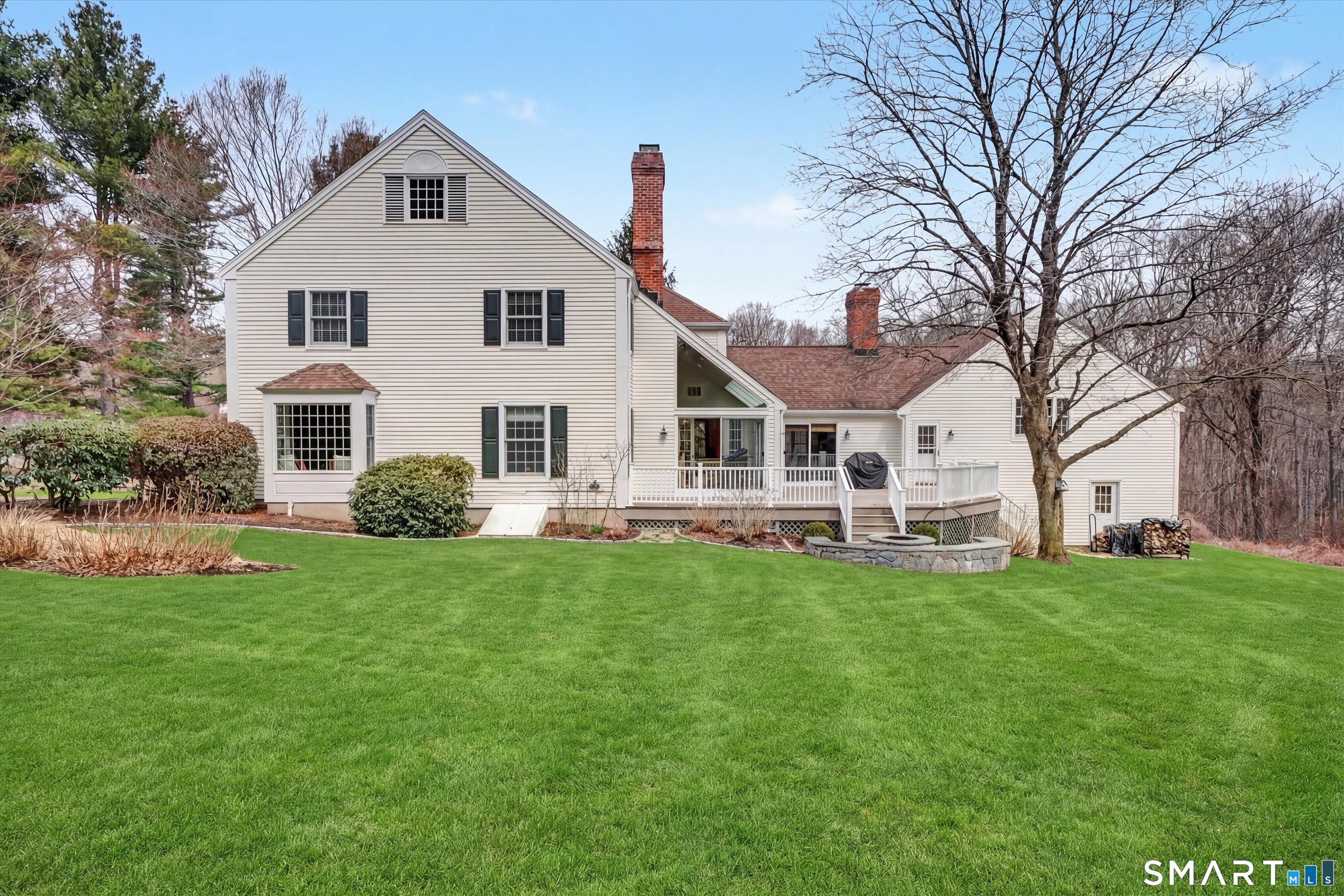 78 Keelers Ridge Road Wilton, CT 06897 - Photo 31 of 40 a view of a house with a yard