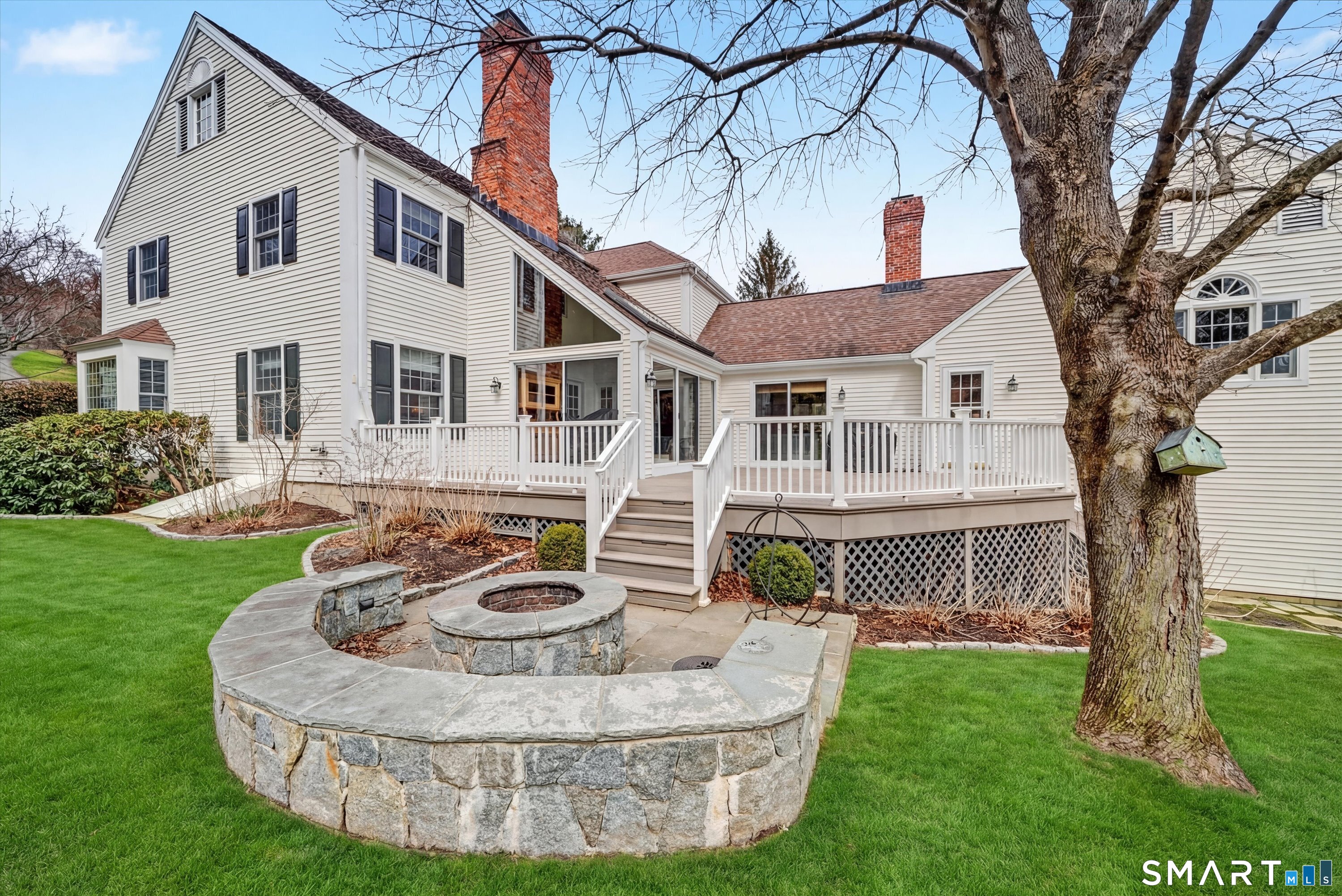 78 Keelers Ridge Road Wilton, CT 06897 - Photo 32 of 40 a front view of a house with a yard