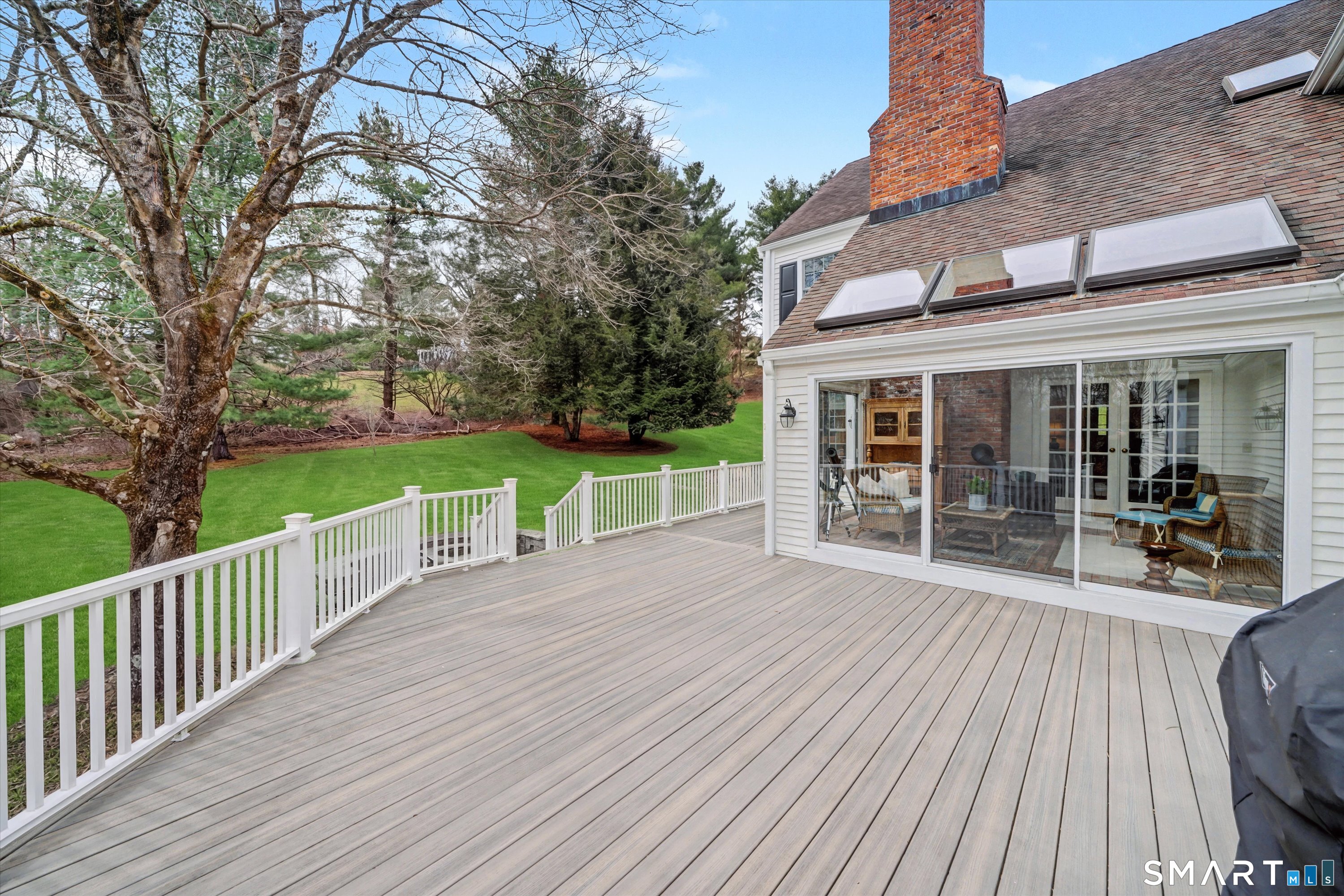 78 Keelers Ridge Road Wilton, CT 06897 - Photo 33 of 40 a view of a house with backyard and porch