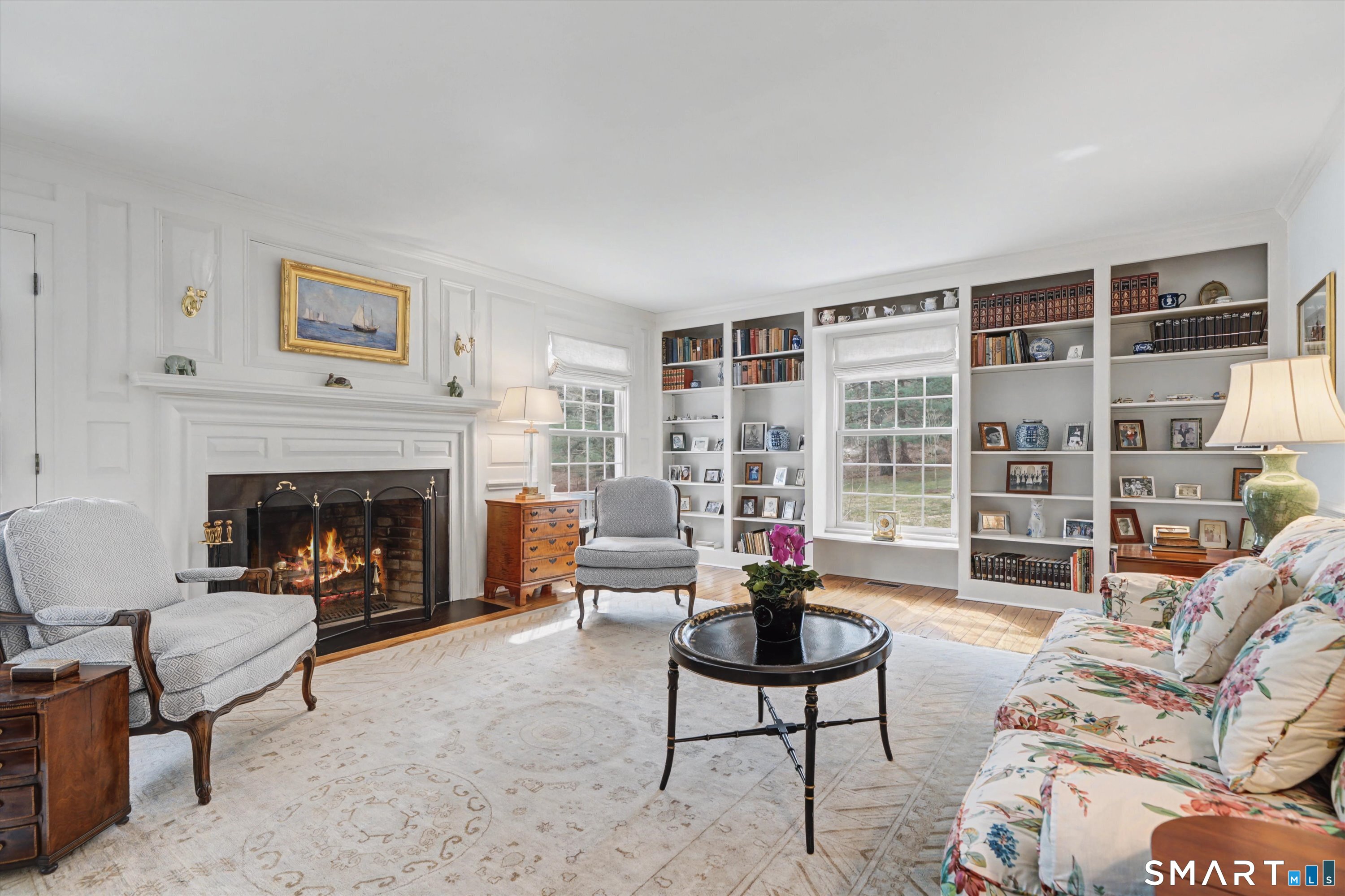 78 Keelers Ridge Road Wilton, CT 06897 - Photo 6 of 40 a living room with furniture large window and a fireplace