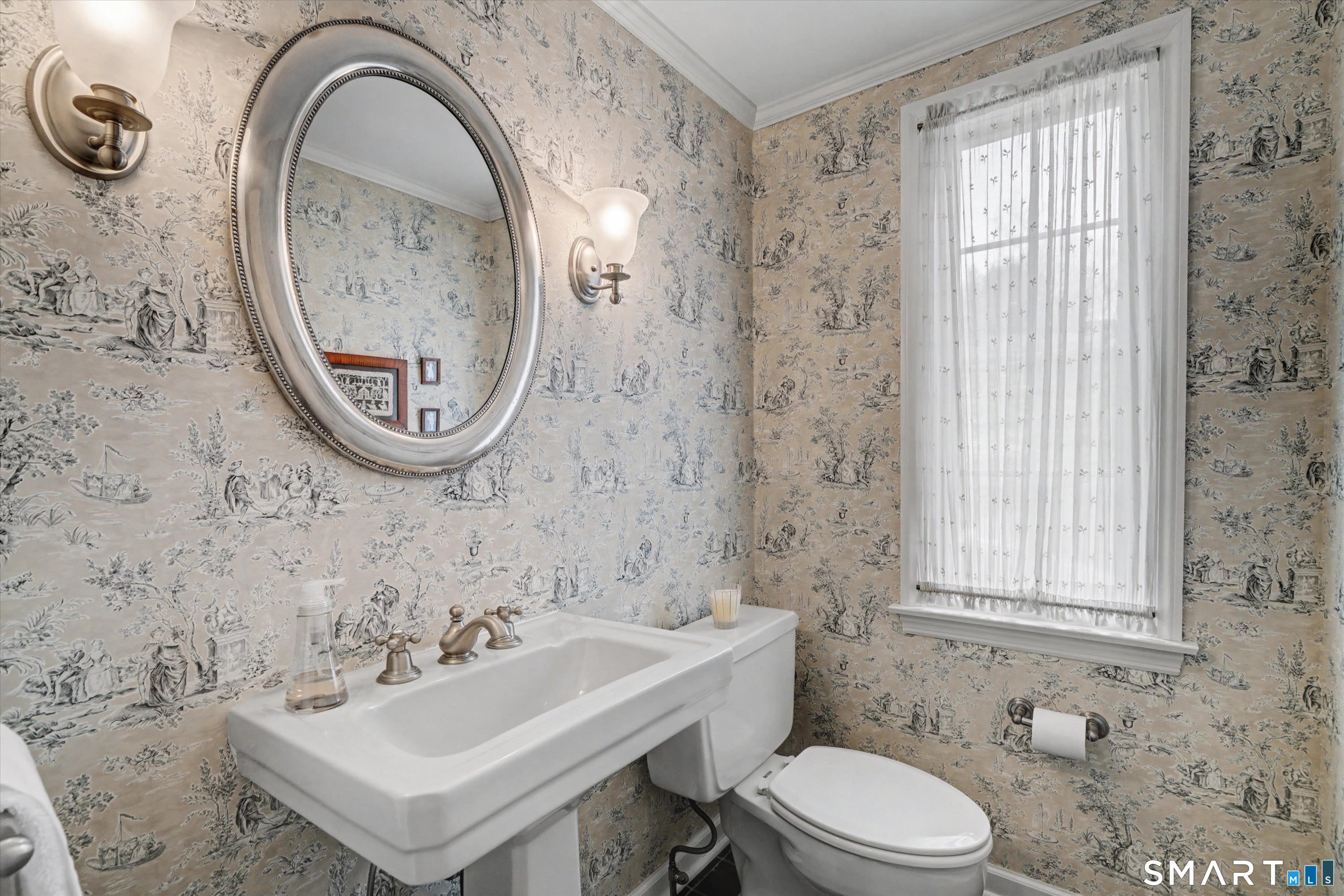 78 Keelers Ridge Road Wilton, CT 06897 - Photo 9 of 40 a bathroom with a sink a toilet and a mirror