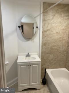 2053 South Cecil Street, Unit 1 Philadelphia, PA 19143 - Photo 8 of 13 a bathroom with a sink and a mirror