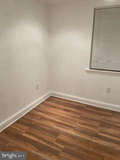 2053 South Cecil Street, Unit 1 Philadelphia, PA 19143 - Photo 10 of 13 a view of a room with wooden floor and cabinet
