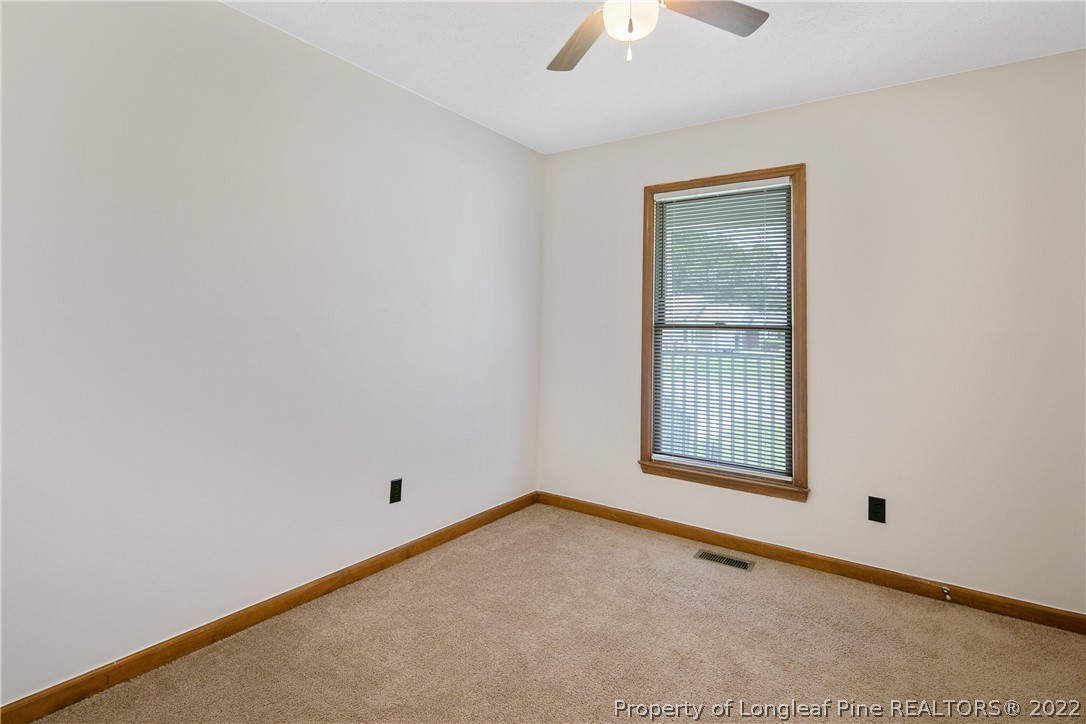 6405 Rhemish Drive Fayetteville, NC 28304 - Photo 17 of 21 an empty room with windows
