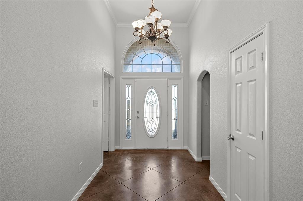 3696 Old Lorena Road Lorena, TX 76655 - Photo 3 of 27 Grand entryway featuring a decorative glass front door, transom window, and sidelights