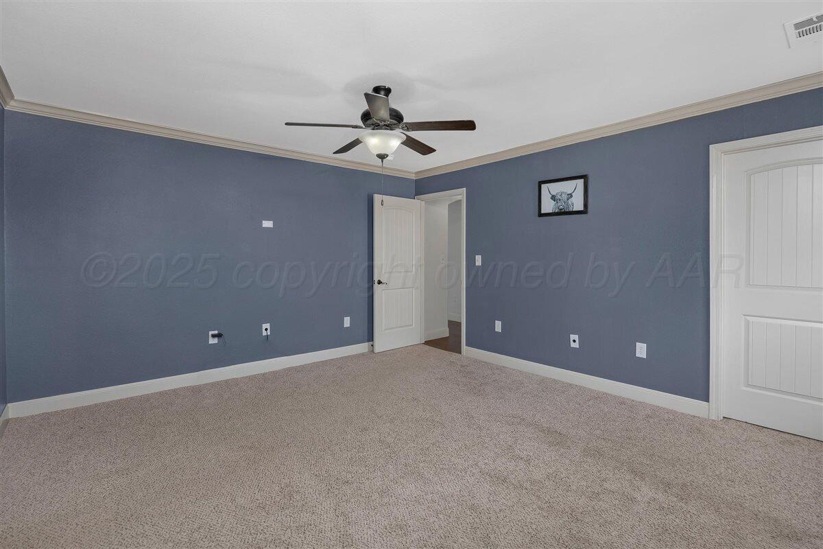 22 Sandra Lane Canyon, TX 79015 - Photo 16 of 25 a view of an empty room with a ceiling fan