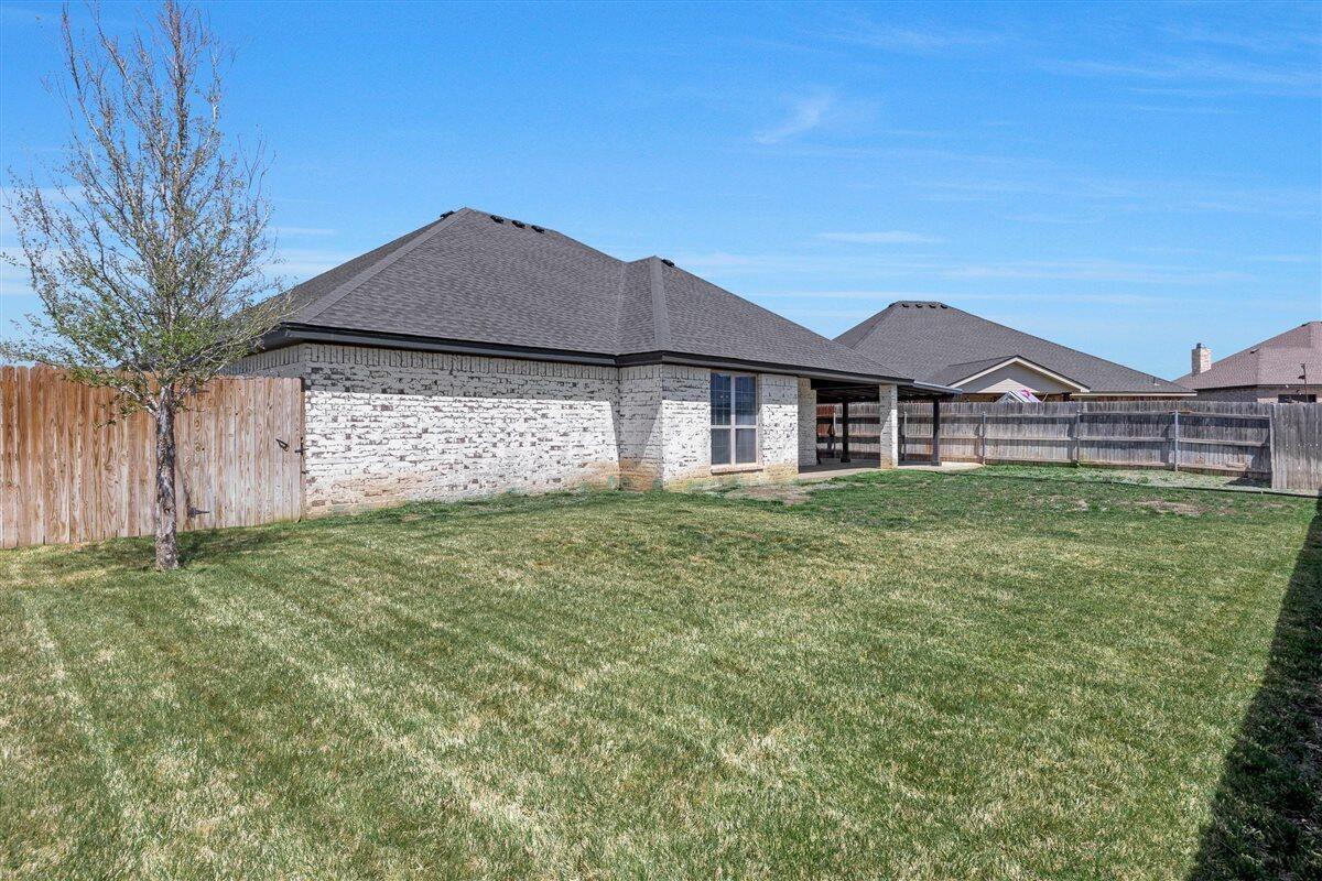 22 Sandra Lane Canyon, TX 79015 - Photo 4 of 25 a front view of a house with garden