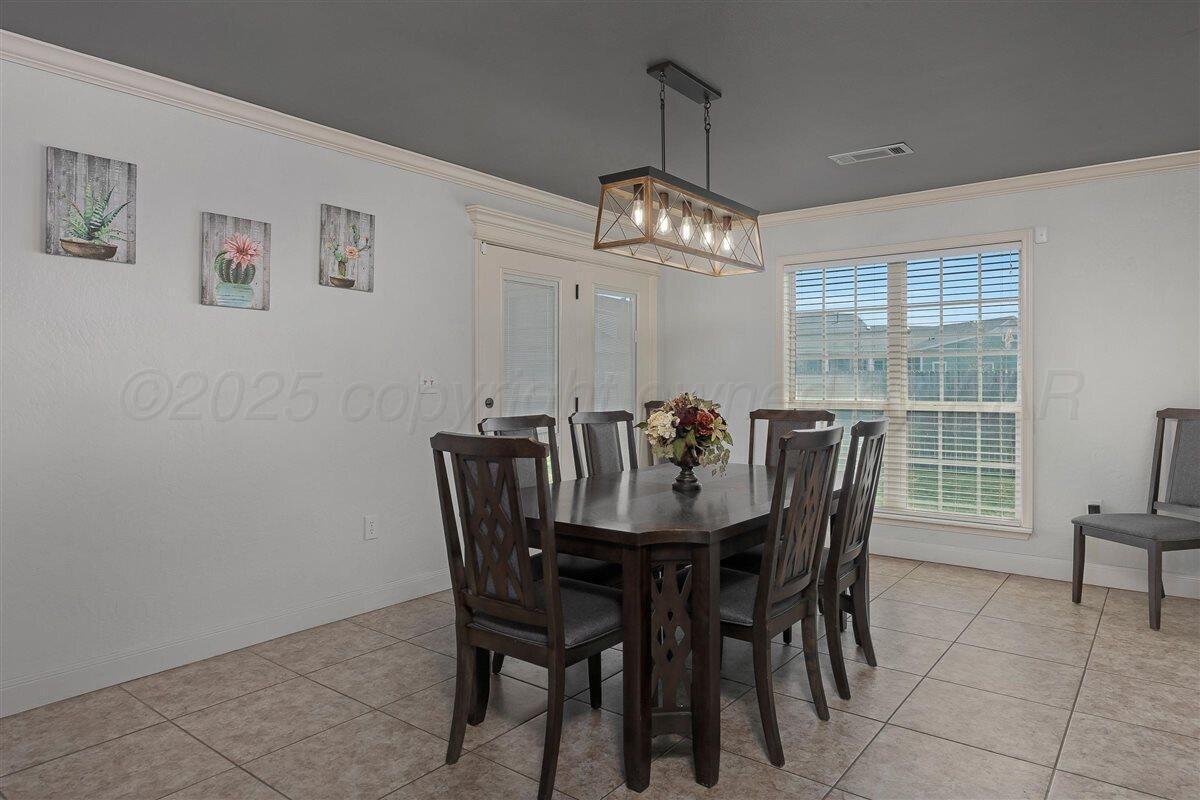 22 Sandra Lane Canyon, TX 79015 - Photo 10 of 25 a view of a dining room with furniture window and outside view