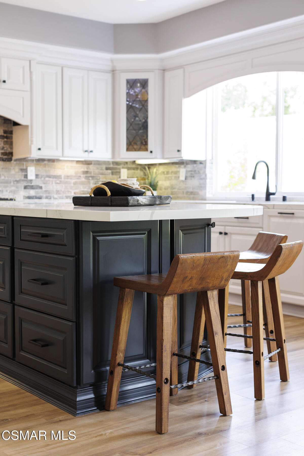5859 Evening Sky Drive Simi Valley, CA 93063 - Photo 16 of 50 a kitchen with a sink cabinets and window