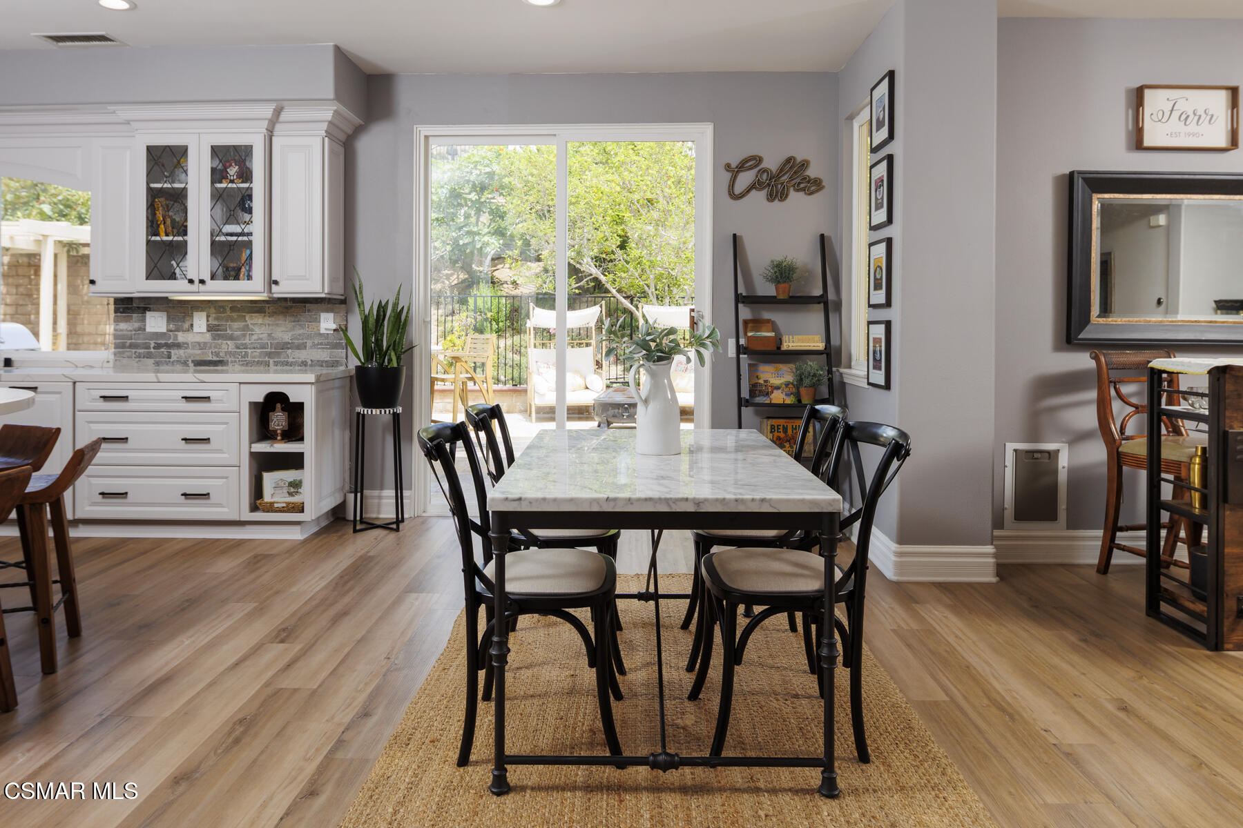 5859 Evening Sky Drive Simi Valley, CA 93063 - Photo 18 of 50 a view of a dining room with furniture and wooden floor
