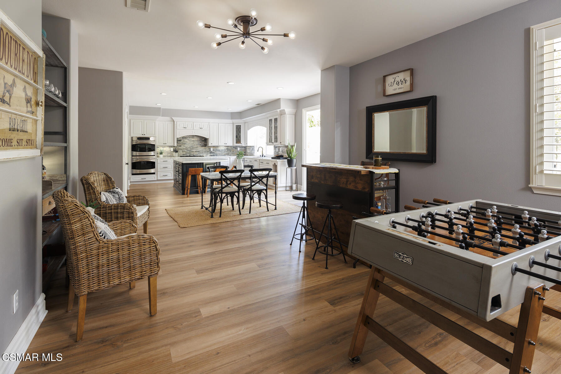 5859 Evening Sky Drive Simi Valley, CA 93063 - Photo 21 of 50 a living room with furniture and a wooden floor