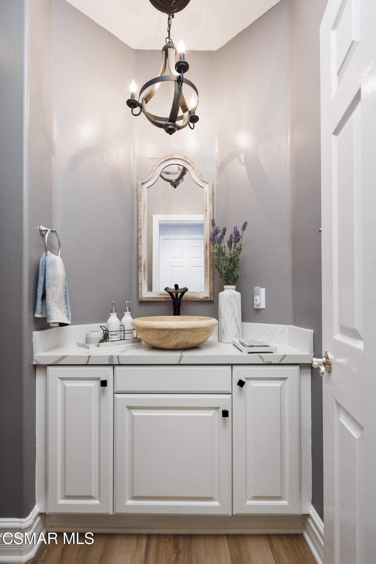 5859 Evening Sky Drive Simi Valley, CA 93063 - Photo 24 of 50 a bathroom with a sink and a mirror