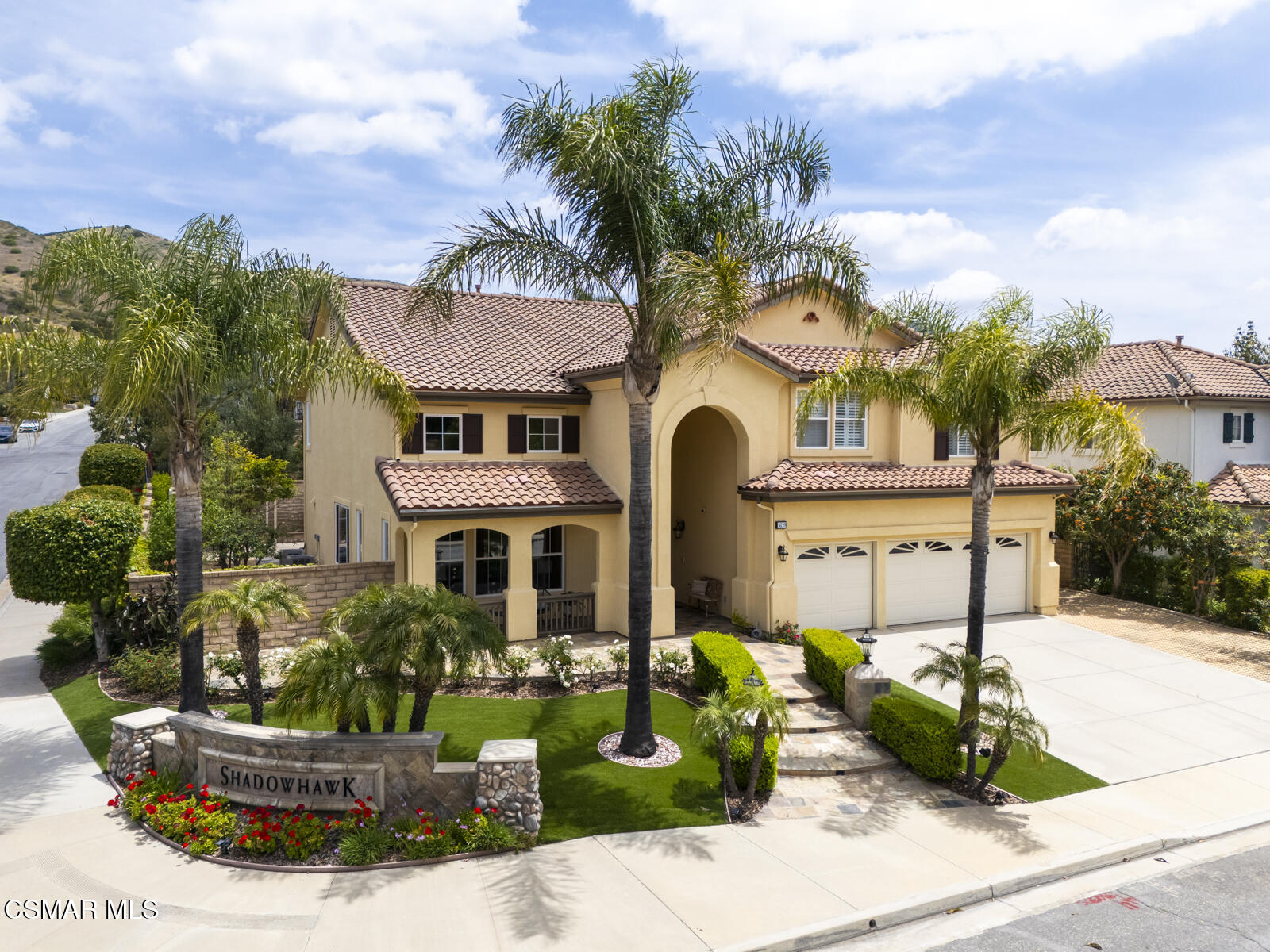 5859 Evening Sky Drive Simi Valley, CA 93063 - Photo 3 of 50 a front view of a house with garden