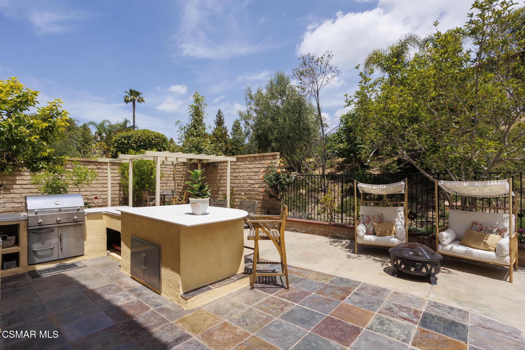 5859 Evening Sky Drive Simi Valley, CA 93063 - Photo 41 of 50 a view of a patio with iron fence