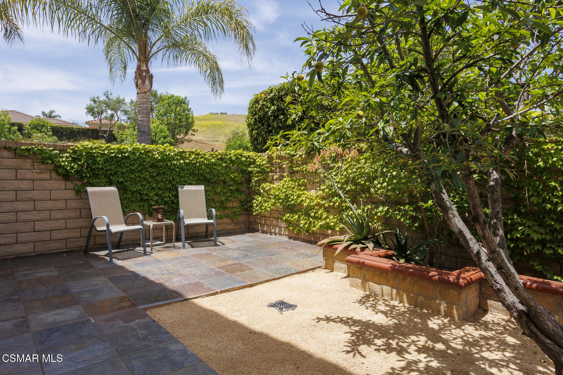 5859 Evening Sky Drive Simi Valley, CA 93063 - Photo 47 of 50 a view of backyard with outdoor seating and plants