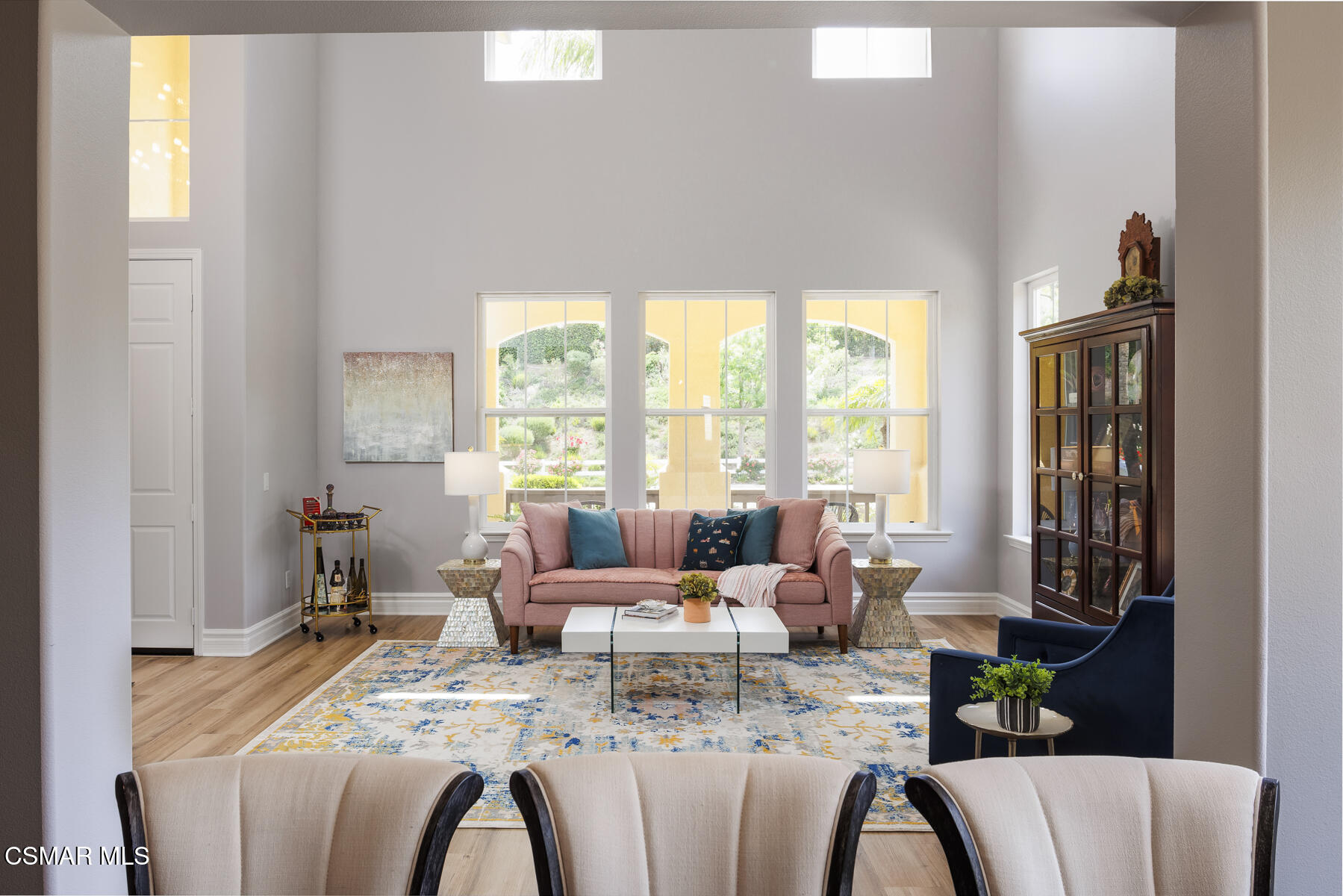 5859 Evening Sky Drive Simi Valley, CA 93063 - Photo 9 of 50 a living room with furniture large windows and wooden floor