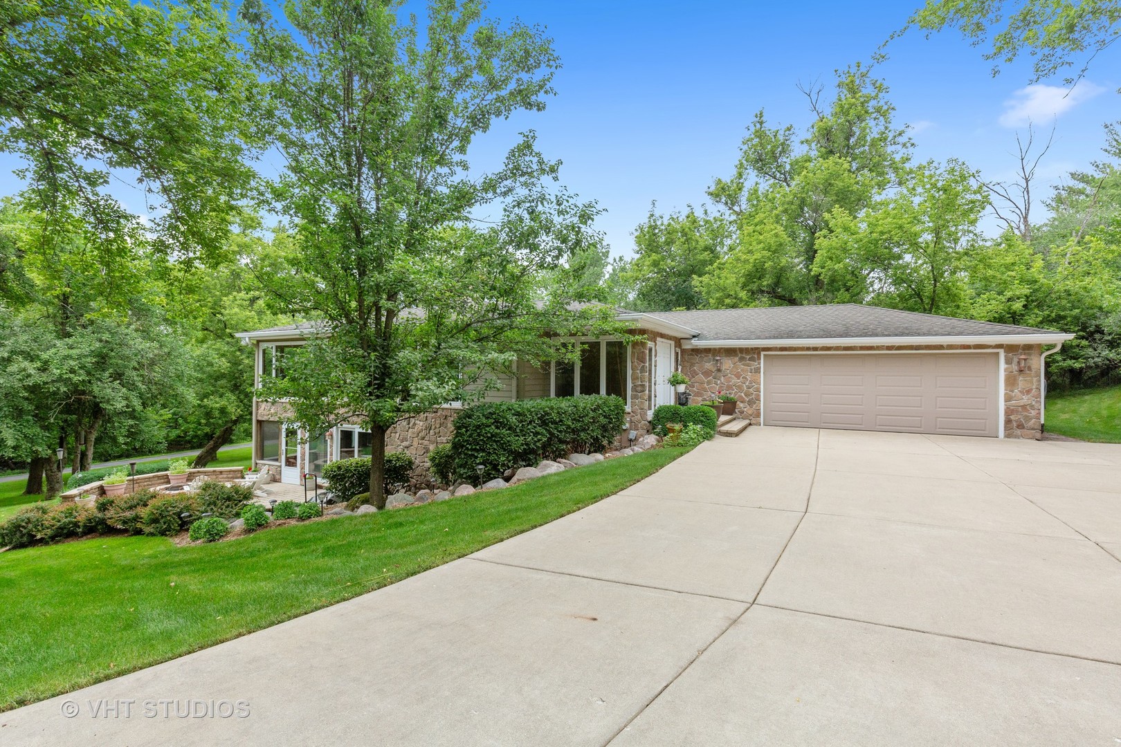 25287 Wren Road Tower Lakes, IL 60010 - Photo 2 of 51 front view of house with a yard and trees
