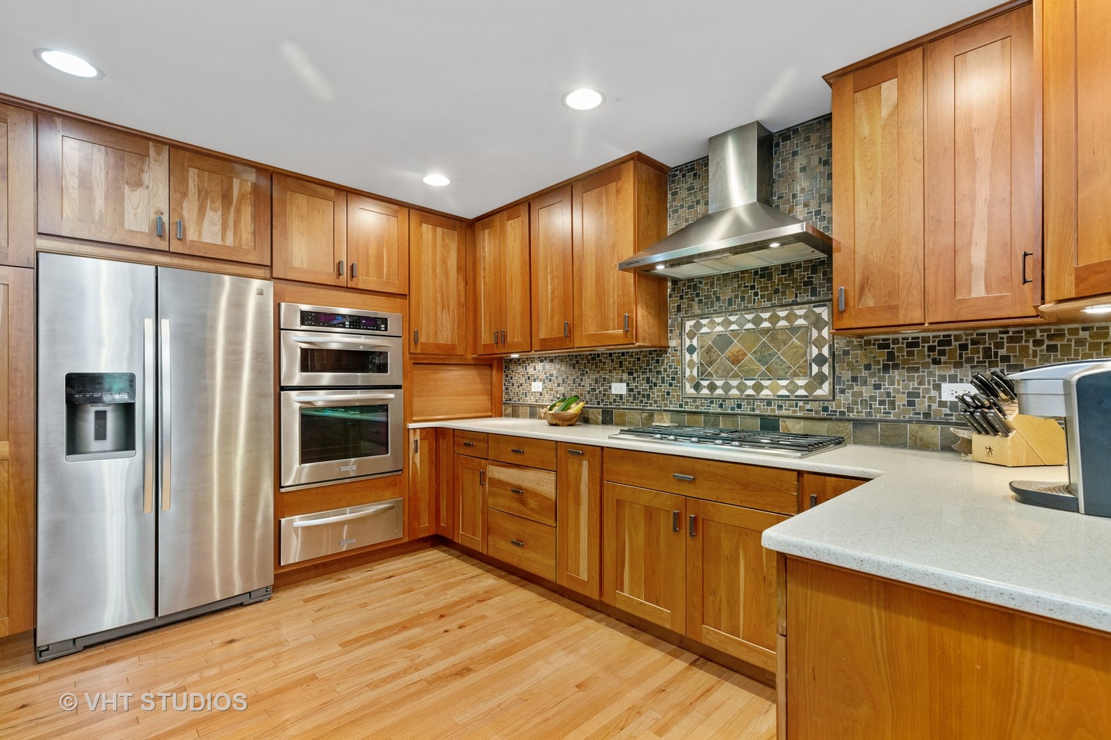 25287 Wren Road Tower Lakes, IL 60010 - Photo 12 of 51 a kitchen with stainless steel appliances granite countertop a refrigerator sink and cabinets