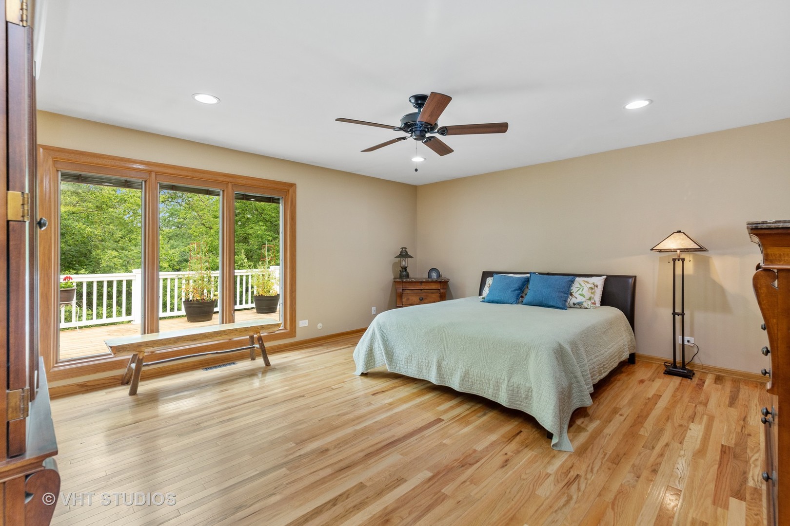 25287 Wren Road Tower Lakes, IL 60010 - Photo 15 of 51 a bedroom with a large bed and a large window